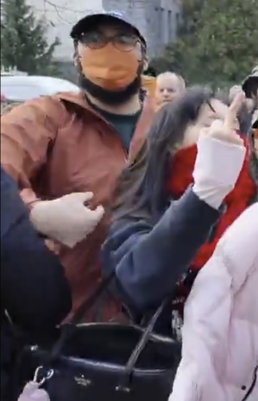 Matthew Kneller shoving a protester at the January 22 UBC riot 