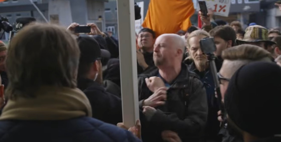 UBC protester assaulting Dallas Brodie's security